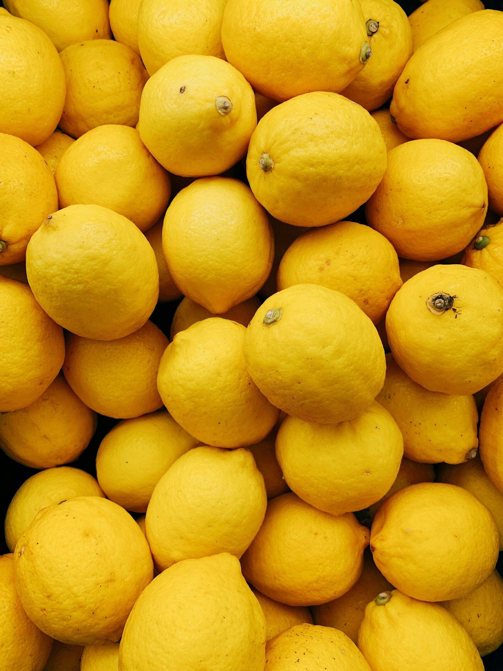 Fresh lemons and natural citrus landscape representing RIVRALA manufacturing origins